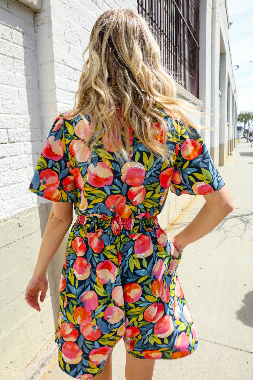 Sunny Days Floral Print Smocked Waist Back Neck Button Romper