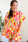 Eyes On You Coral Geo Abstract Surplice Woven Romper